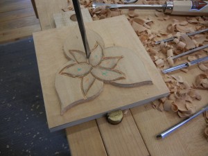Defining the petals with a vertical cut - after outlining with a v-chisel