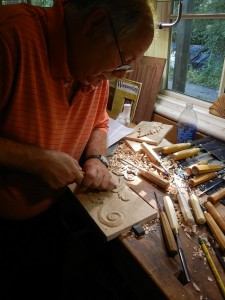 George Edwards carving a beautiful acanthus scroll.