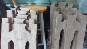 All the chair backs with scrolls and angry swans carved into them.