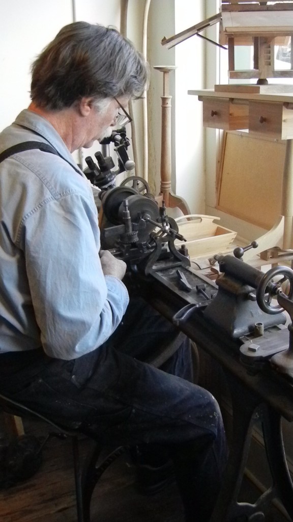 Roy working on his foot pedal metal lathe.