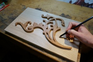 Draw a rough outline around the carving design to know where to lay the double sided tape.