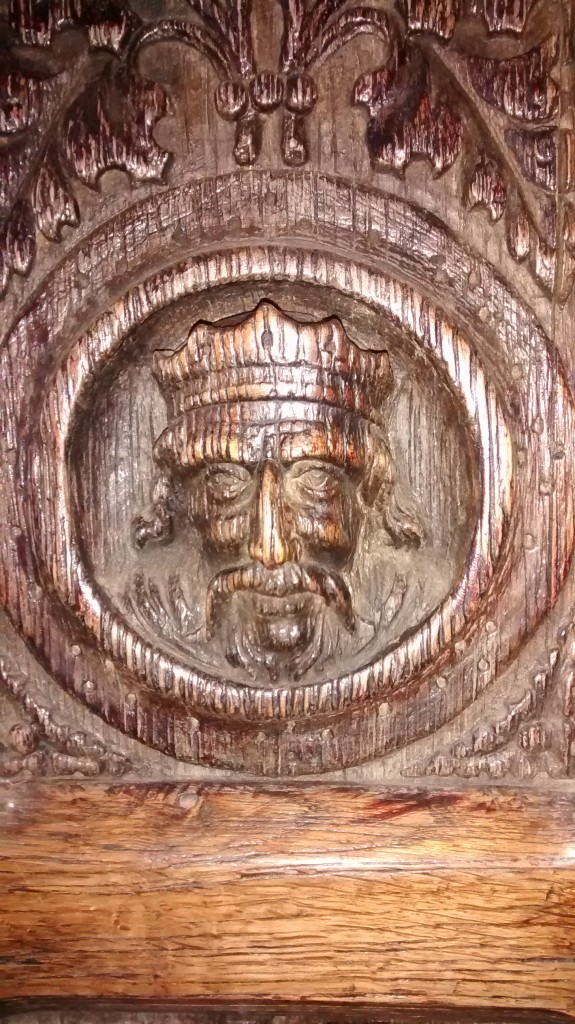 King carved in oak in Tudor house - from about 1300.