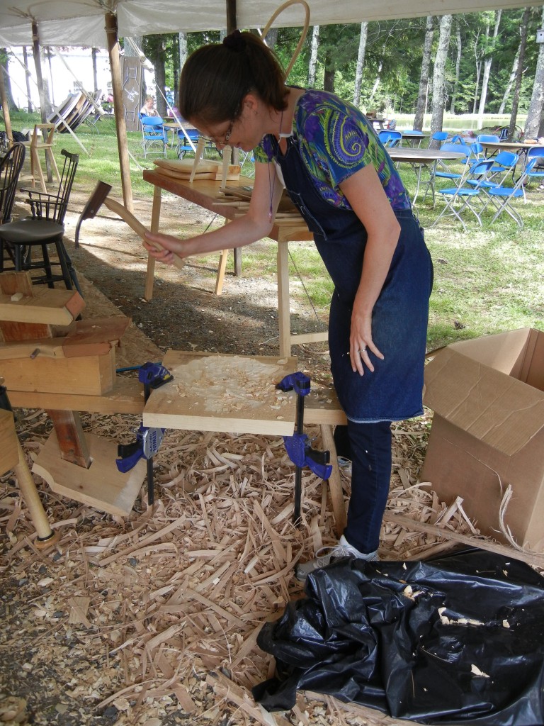 That's me learning a new kind of carving on a chair seat from Peter Galbert. Fun! And REALLY fast!