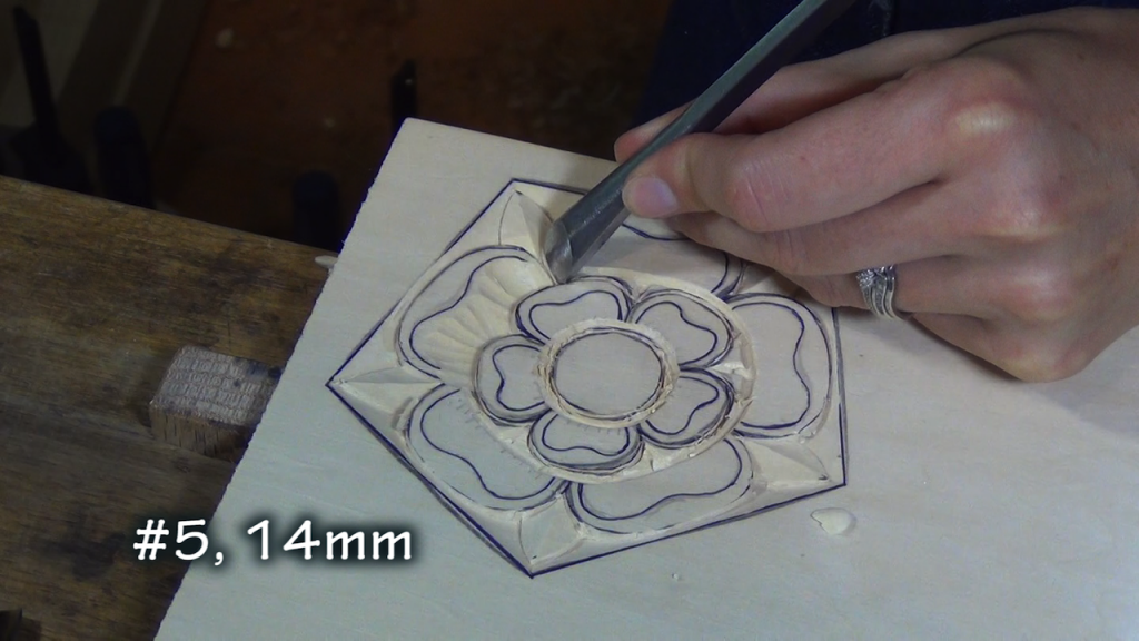 With a #5, 14mm, make 2 cuts at an angle to separate each of the large petals.