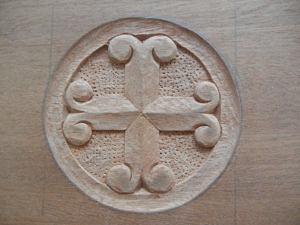 Carving a Cross in a Circle