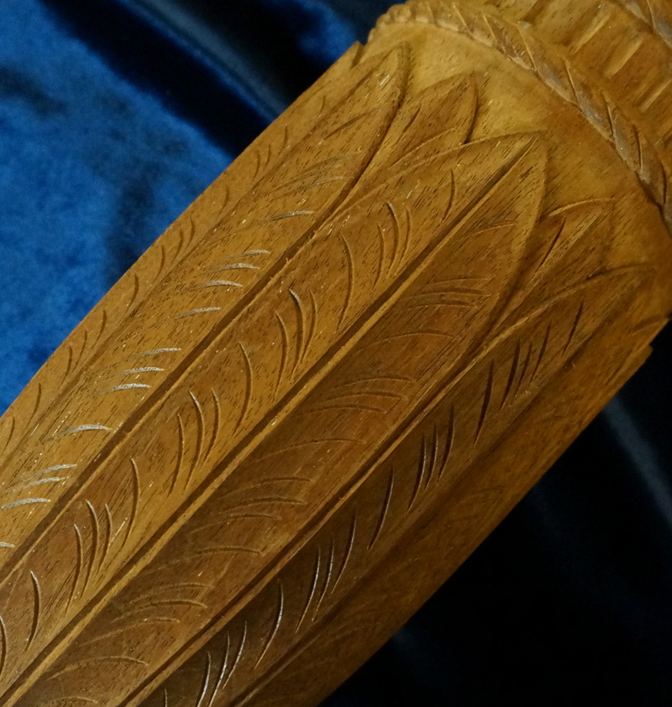 Carving an Urn with Water Leaves