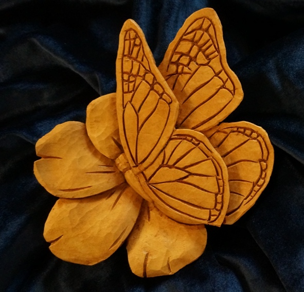Carving a Butterfly on a Flower