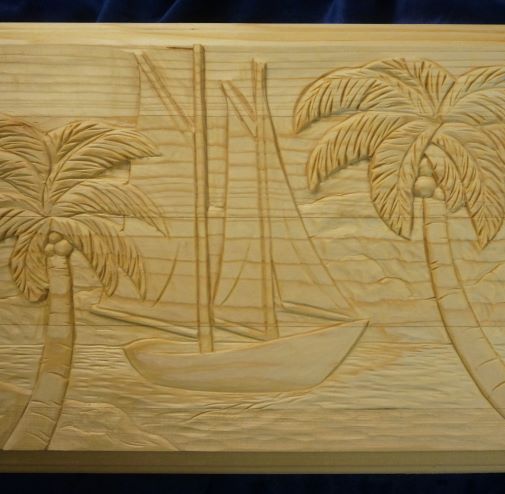 Carving a Tropical Sailboat Scene